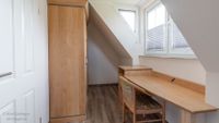 Ferienhaus Dierhagen: Schreibtisch im ersten Schlafzimmer.